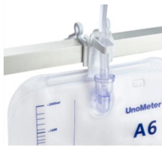 UnoMeter A6 hanging solution with integrated hook on a bed rail