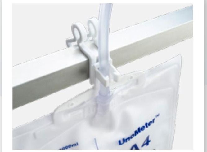UnoMeter A4 integrated hanger solution attached to a bed rail